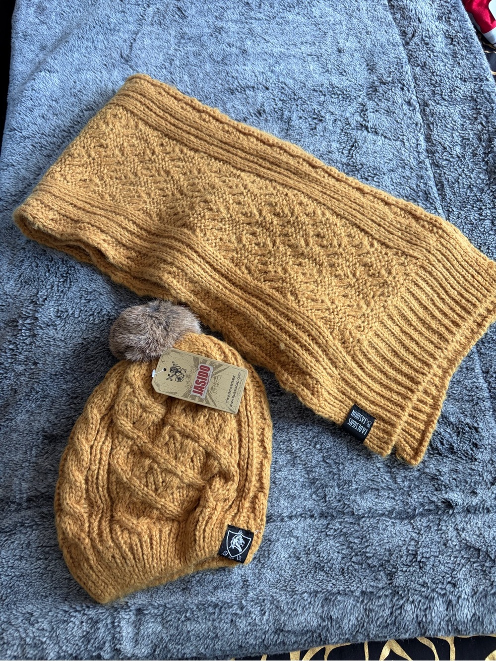 Outdoor Cable Knit Pom Beanie in Mustard